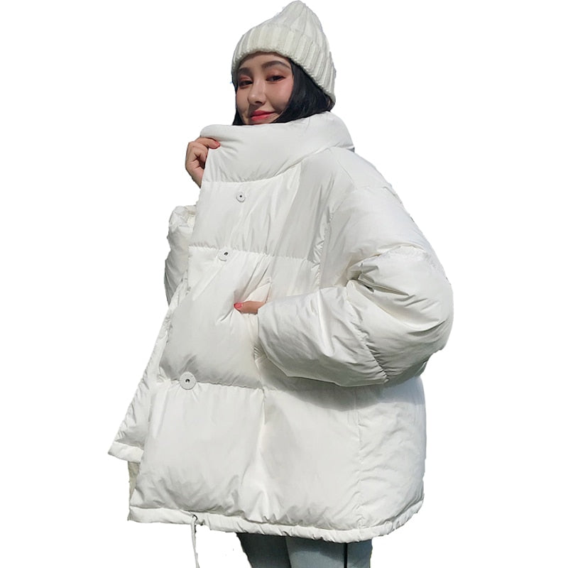 Estilo coreano 2019 Chaqueta de invierno Mujer Cuello alto Sólido Negro Blanco Abrigo de plumón femenino Suelto Parka corta para mujer de gran tamaño