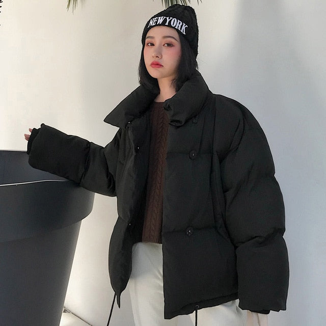 Estilo coreano 2019 Chaqueta de invierno Mujer Cuello alto Sólido Negro Blanco Abrigo de plumón femenino Suelto Parka corta para mujer de gran tamaño