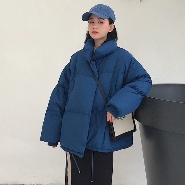 Estilo coreano 2019 Chaqueta de invierno Mujer Cuello alto Sólido Negro Blanco Abrigo de plumón femenino Suelto Parka corta para mujer de gran tamaño